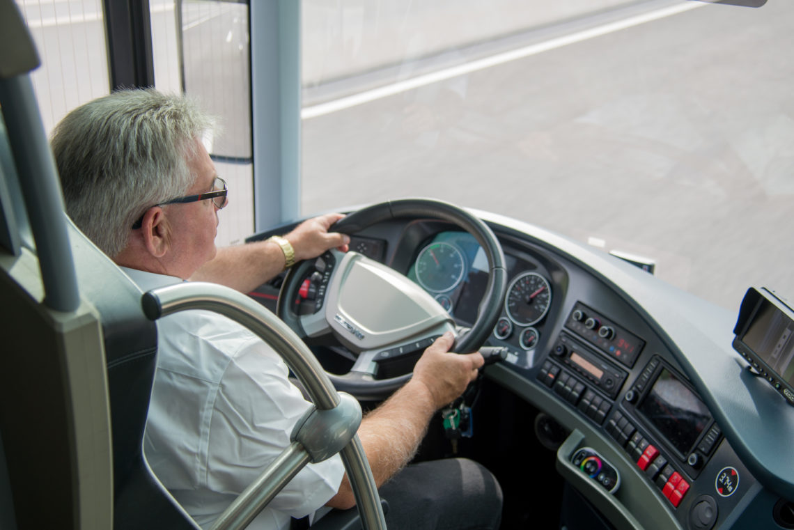 Busfahrer und Reisebegleitungen